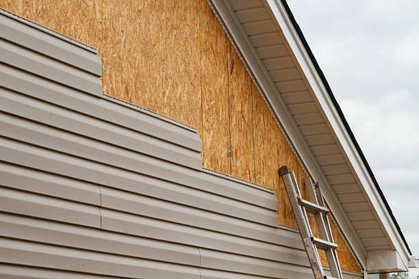 Professional Siding Replacement technician working in Rockfall, CT
